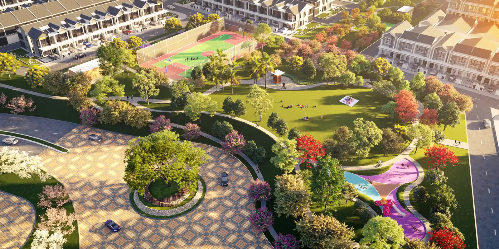 Aerial view of Central Park, Sanubari, showing basketball court, playground and jogging paths